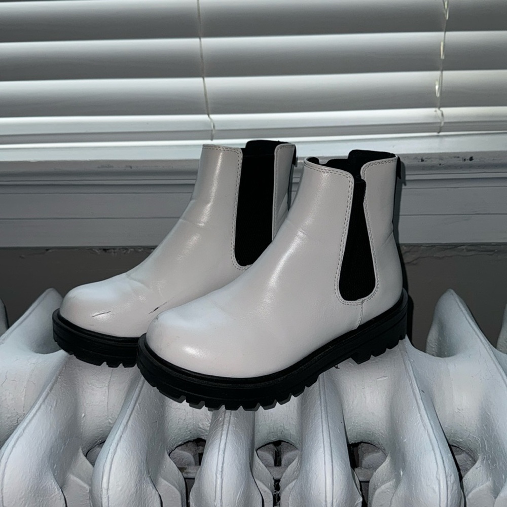 White and black boots
